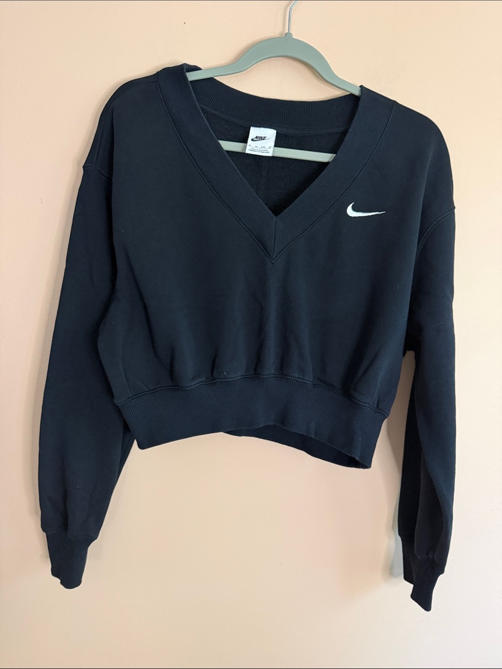 Nike Black Cropped V-Neck Sweatshirt with White Swoosh